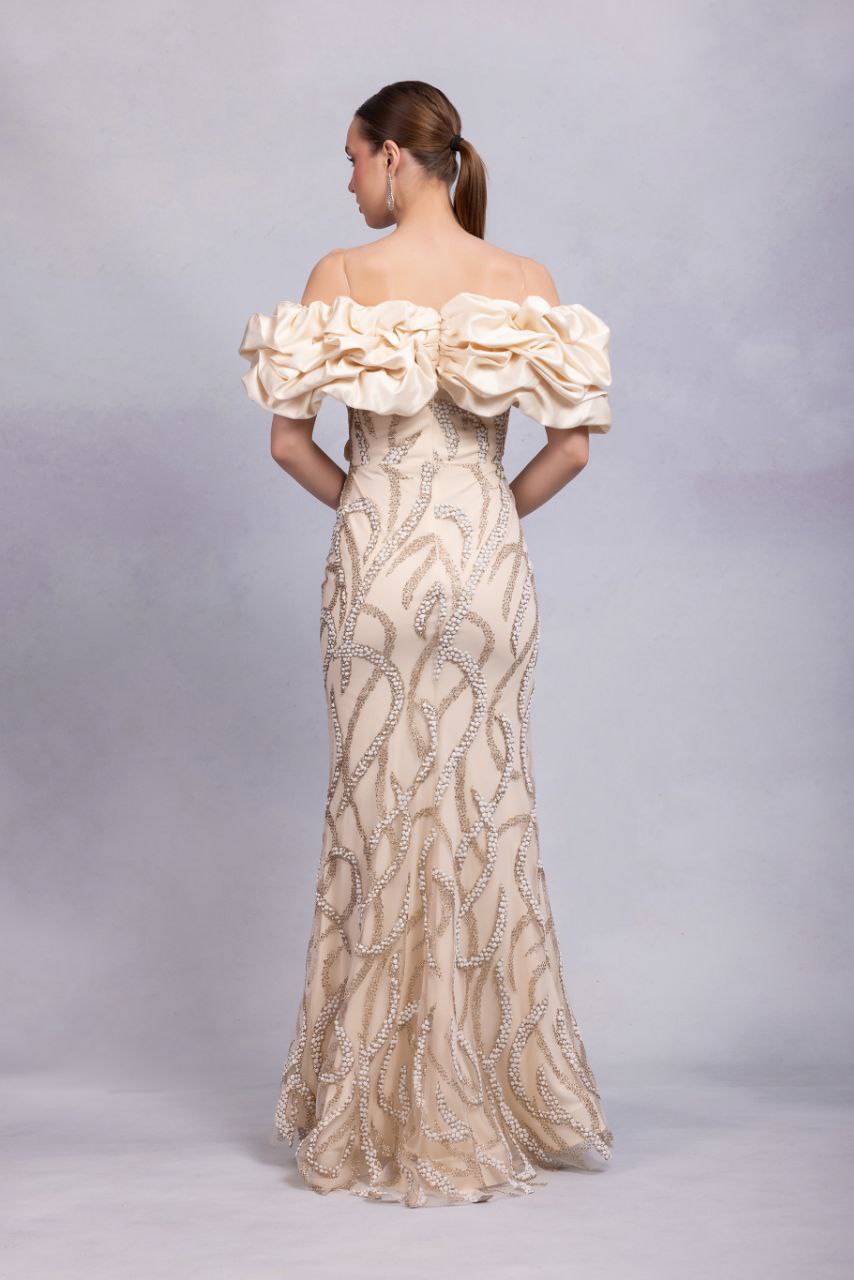 Odrella Champagne Off-the-Shoulder Gown with Sculptural Ruffle & Silver Embellishments
